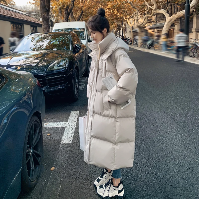 2023 pehelykabátok Új hosszú stílusú pamutruha koreai változat Nagy méretű koreai divatkabátok Téli meleg Feminina télikabátok - 1