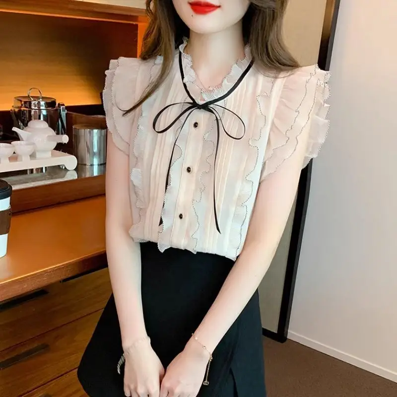 Egyszínű O-nyakú ujjatlan gombok Patchwork irodai hölgyblúzok Koreai divat édes fiatal stílus Nyár Új női ruházat - 1