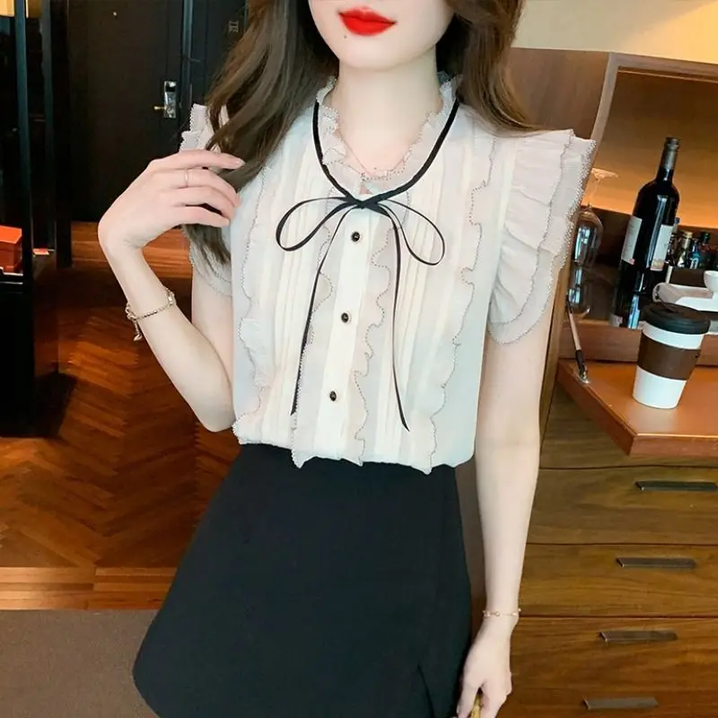 Egyszínű O-nyakú ujjatlan gombok Patchwork irodai hölgyblúzok Koreai divat édes fiatal stílus Nyár Új női ruházat - 2