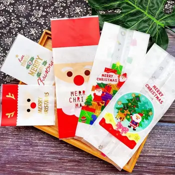 50/100Db ajándékcsomagok Karácsonyi cukorka táska Műanyag zacskók Boldog karácsonyt Csomagoló táskák Kekszek Snack Hópehely tészta